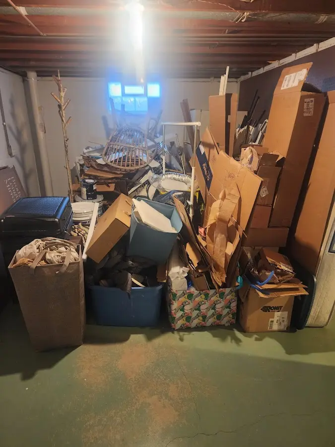 Roll-off dumpster container at job site for 4 Yard Dumpster Rental in Proctor